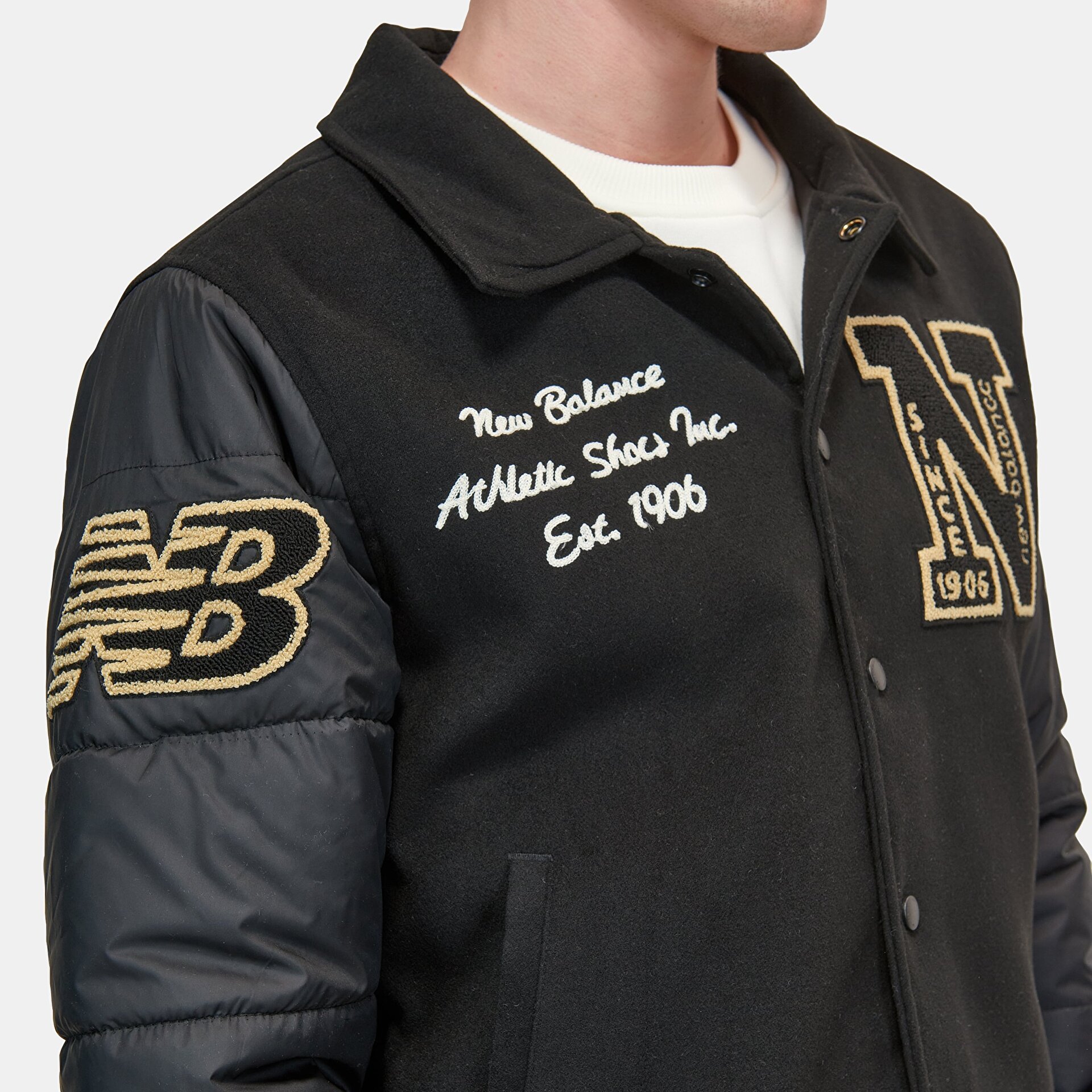 new-balance-mnj3391-siyah-erkek-mont-amp-yelek